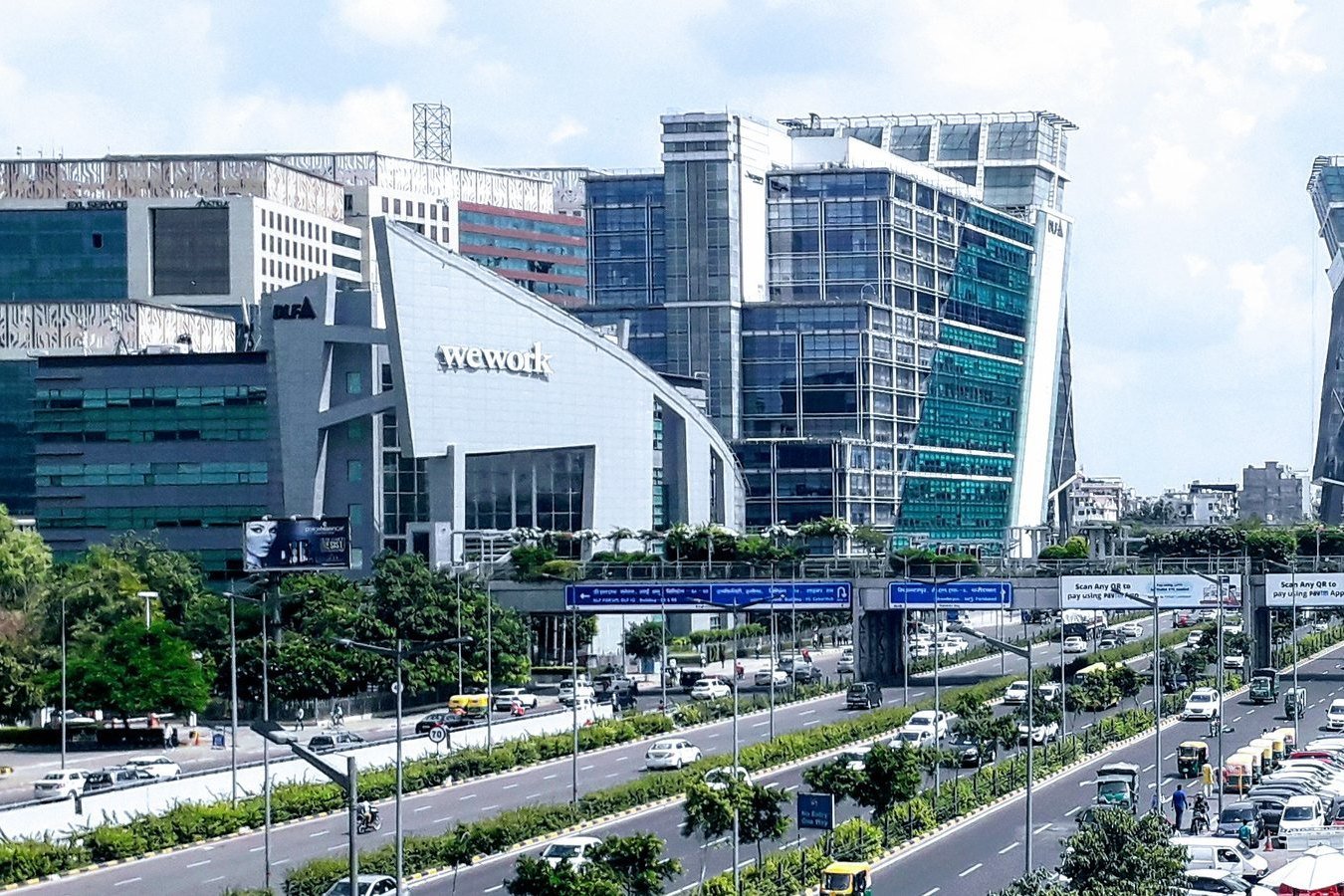 The DLF Cyber City towers, with the Cyber Hub entrance at the right